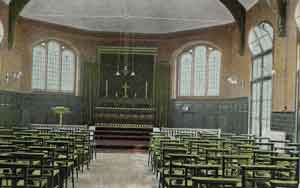 Looking from the back, over the chairs towards the altar